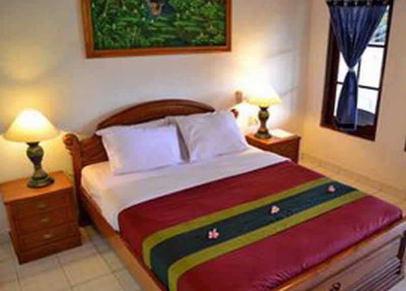 Flamboyan Hotel Кута Экстерьер фото