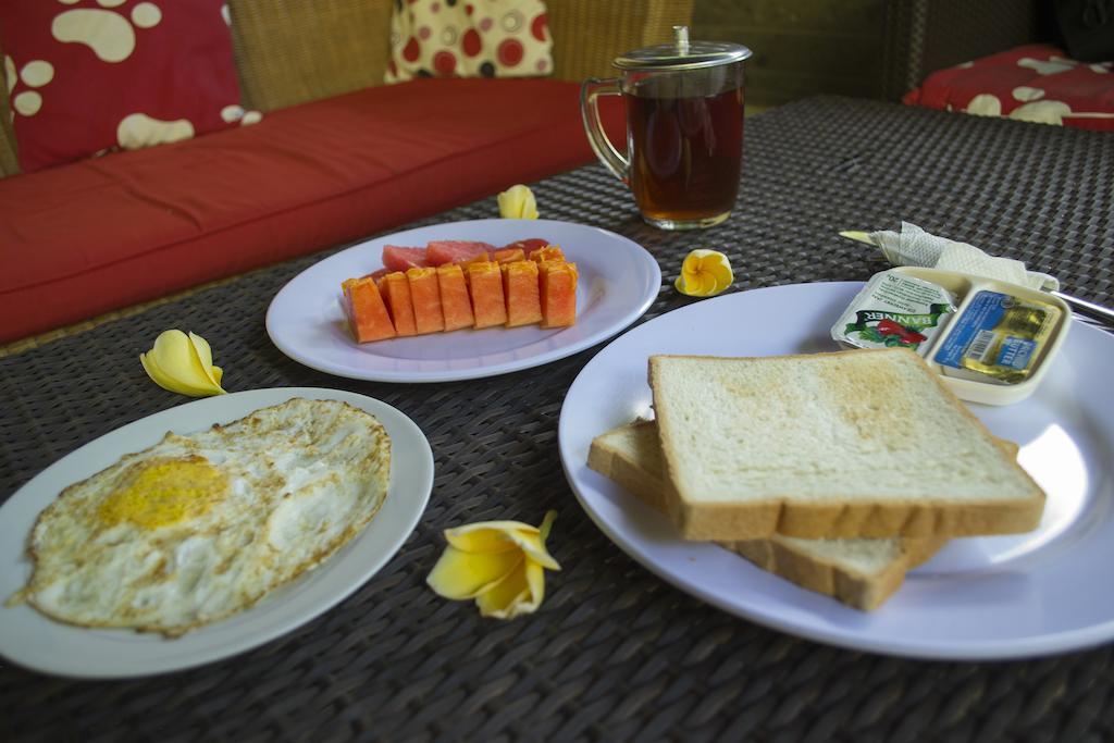 Flamboyan Hotel Кута Экстерьер фото