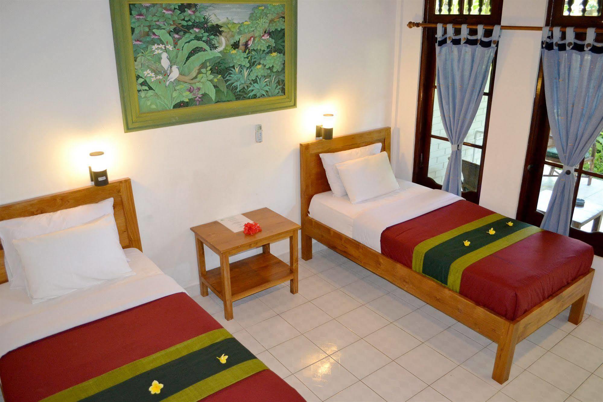 Flamboyan Hotel Кута Экстерьер фото